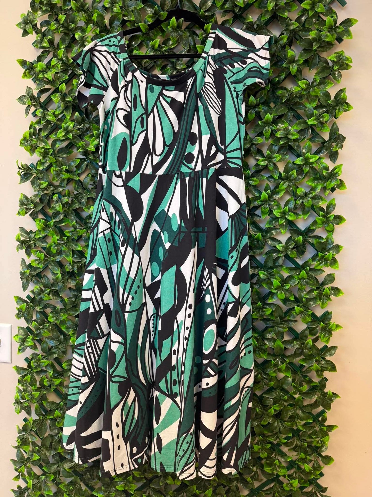 Pualele Flair Dress – Emerald Green, Black & White Butterfly Motif